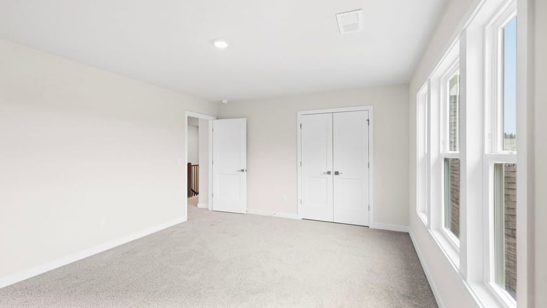 Spacious, unfurnished interior of a new home in Adams Glen, Greenville (Image 34).