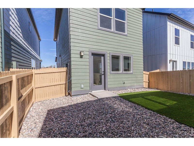 Exterior details and patio area of a home in Prairie Song Cottages, Windsor (Image 25).
