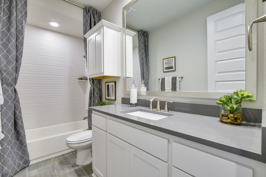 Representative furnished interior of a home built from the Madera II by Giddens Homes in Scofield Farms Estates, Georgetown (Image 18).