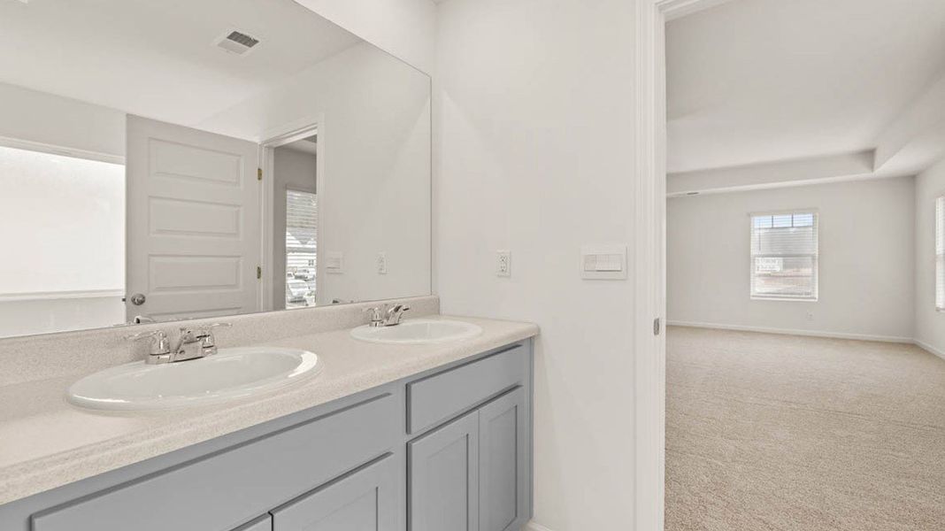 Representative furnished interior of a home built from the Packard by D.R. Horton in Evergreen Crossing, Locust Grove (Image 10).