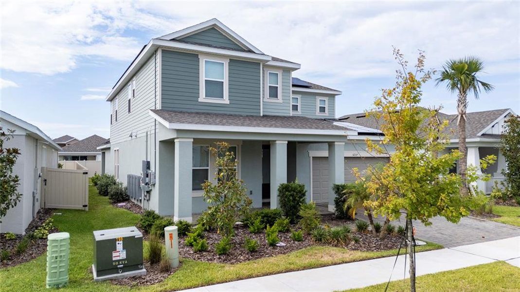Front exterior of a new home in Center Lake Ranch Community Group Page, St. Cloud, FL, highlighting curb appeal (Image 19). Front exterior of a new home in Center Lake Ranch Community Group Page, St. Cloud, FL, highlighting curb appeal (Image 19).