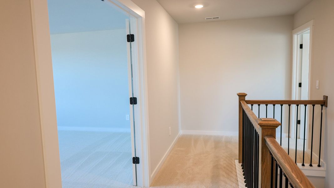 Representative unfurnished interior of a home built from the TISDALE by D.R. Horton in Harvest Point, Spring Hill (Image 53).