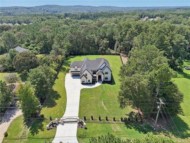 Front exterior of a new home in , Hoschton, GA, highlighting curb appeal (Image 38). Front exterior of a new home in , Hoschton, GA, highlighting curb appeal (Image 38).