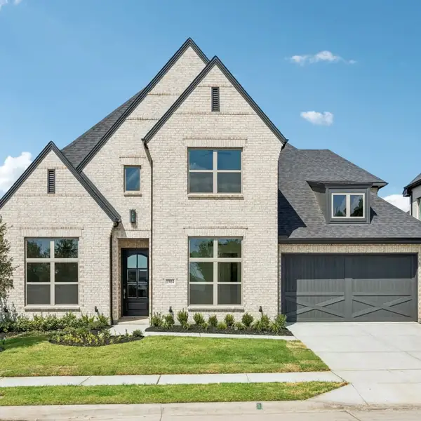 Front exterior of a new home in The Parks at Wilson Creek, Celina, TX, highlighting curb appeal (Image 25). Front exterior of a new home in The Parks at Wilson Creek, Celina, TX, highlighting curb appeal (Image 25).