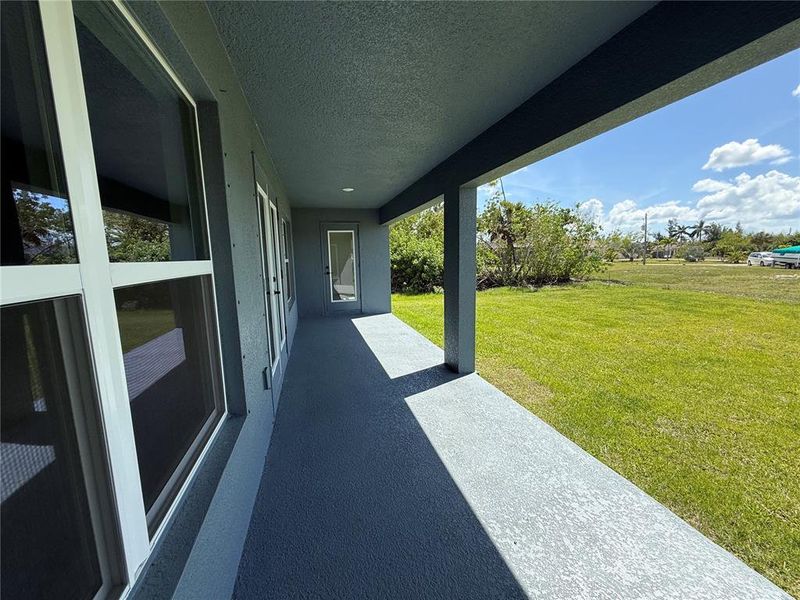 Exterior details and patio area of a home in Port Charlotte, Port Charlotte (Image 17).