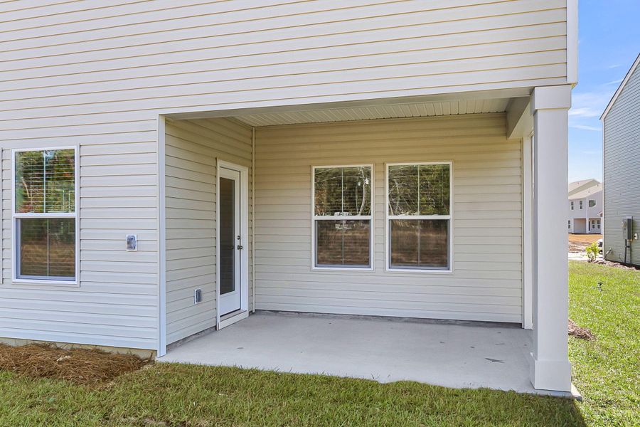 Exterior details and patio area of a home in Wildcat Chase, Summerville (Image 28).