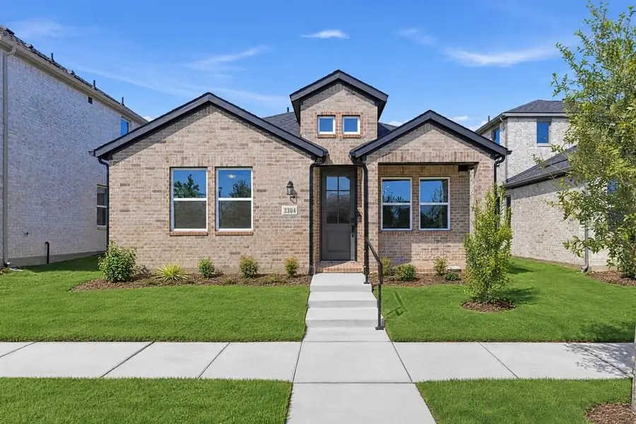 Front exterior of a new home in North Sky Celina, Celina, TX, highlighting curb appeal (Image 1). Front exterior of a new home in North Sky Celina, Celina, TX, highlighting curb appeal (Image 1).
