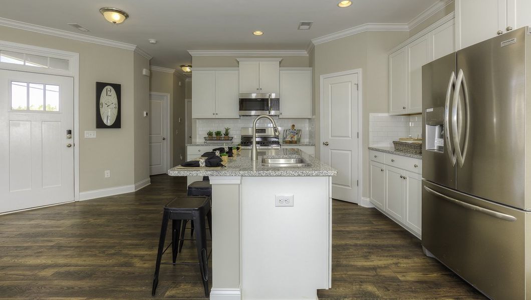 Representative furnished interior of a home built from the Carson by D.R. Horton in Townes at Tap Root Farms, Fletcher (Image 4).