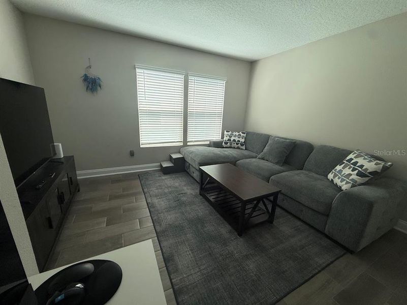 Furnished interior view inside a new home in Sawmill Branch, Palm Coast (Image 5).