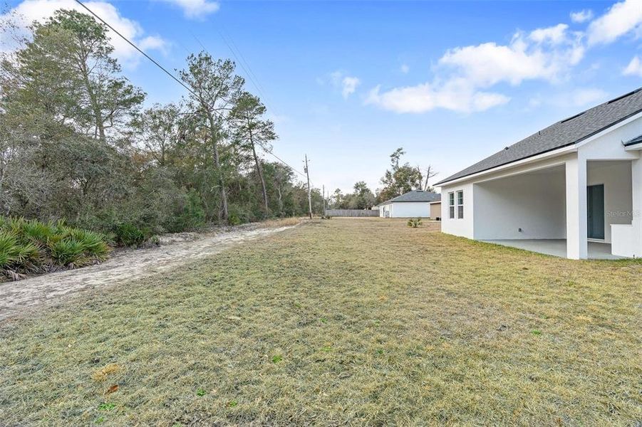 Exterior details and patio area of a home in , Ocala (Image 19).