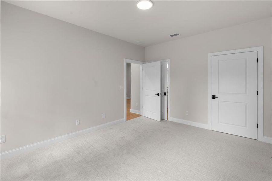 Spacious, unfurnished interior of a new home in Ward's Crossing Townhomes, Johns Creek (Image 18).