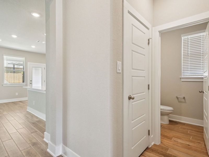 Hallway in the Red River floorplan at a Meritage Homes community.