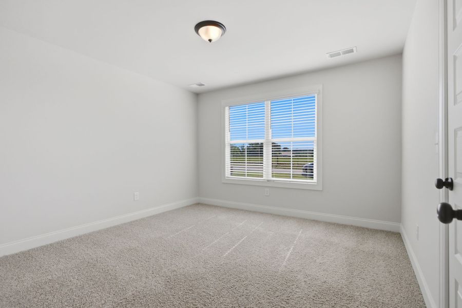 Spacious, unfurnished interior of a new home in Cherokee Knoll, Williamston (Image 27).