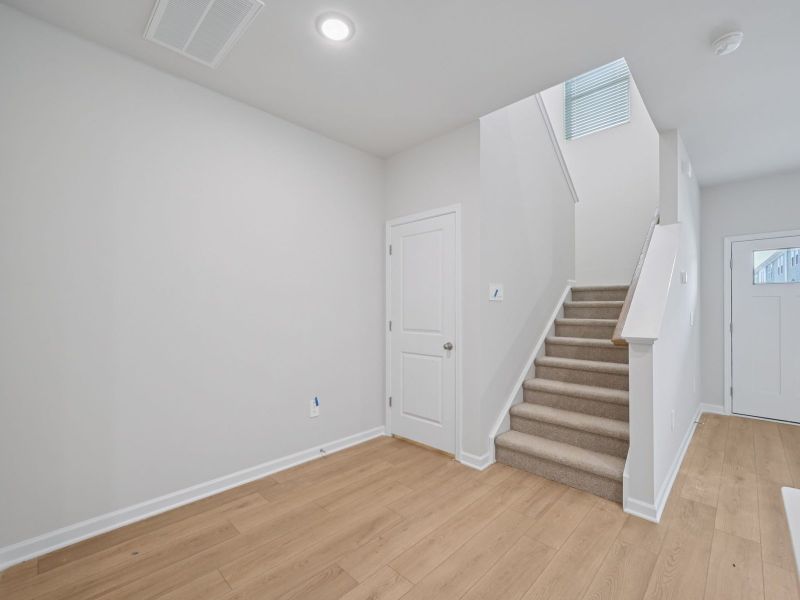 Spacious, unfurnished interior of a new home in The Rows at Buffaloe Reserve, Raleigh (Image 12).