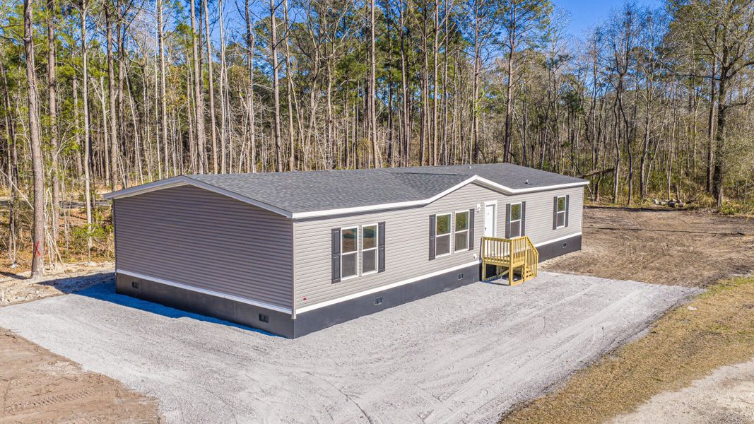 Exterior details and patio area of a home in , Summerville (Image 18).