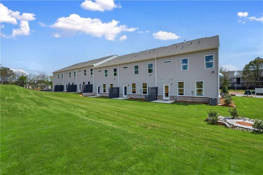 Exterior details and patio area of a home in Avery Landing, McDonough (Image 25).