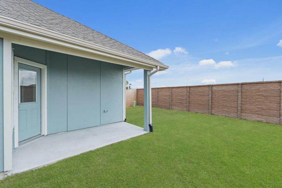 Representative exterior details of a home built from the Chalet by Chesmar Homes in Meridiana Townhomes, Iowa Colony (Image 28).