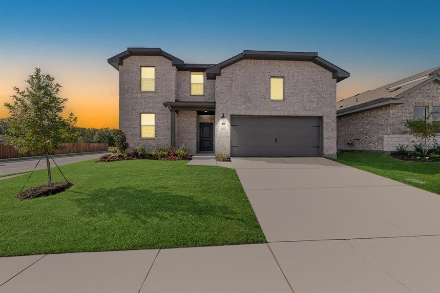 Front exterior of a new home in Aspire at Noble Ridge, Howe, TX, highlighting curb appeal (Image 23). Front exterior of a new home in Aspire at Noble Ridge, Howe, TX, highlighting curb appeal (Image 23).