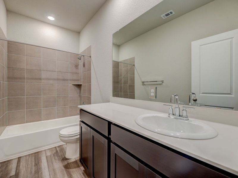 Furnished interior view inside a new home in Butler Farms - Reserve Collection, Liberty Hill (Image 6). Furnished interior view inside a new home in Butler Farms - Reserve Collection, Liberty Hill (Image 6).