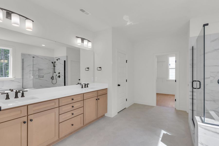 Representative furnished interior of a home built from the The Hampton by RobuckHomes in Stonehenge, Raleigh (Image 68).