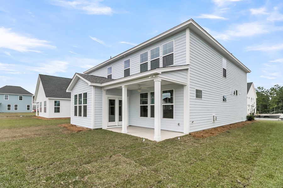 Exterior details and patio area of a home in Hewing Farms, Summerville (Image 23).