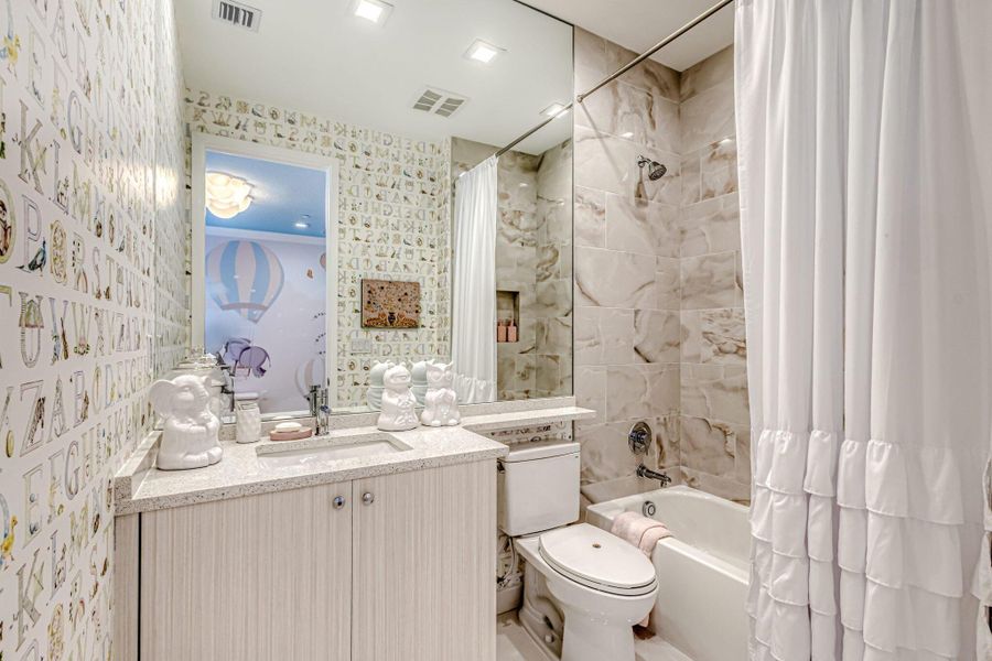 Furnished interior view inside a new home in Apex at Avenir, Palm Beach Gardens (Image 41).