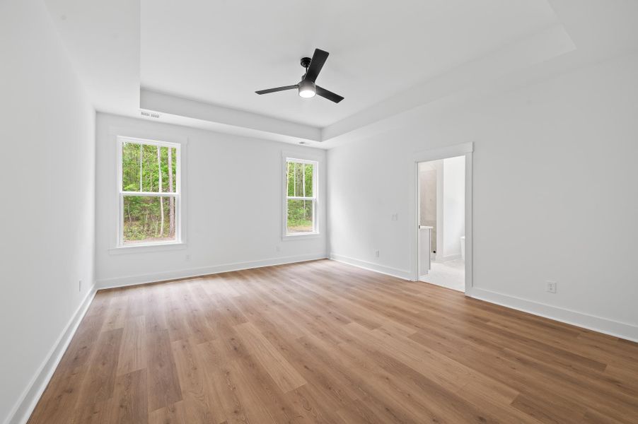 Spacious, unfurnished interior of a new home in Long Bay Golf Club, Longs (Image 26).