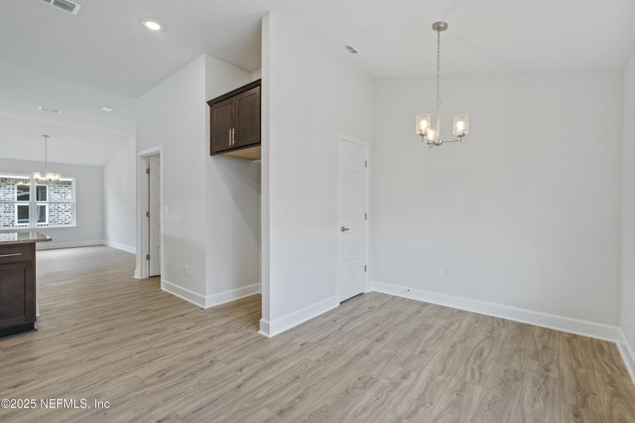 Spacious, unfurnished interior of a new home in Shadow Crest at Rolling Hills, Green Cove Springs (Image 8).