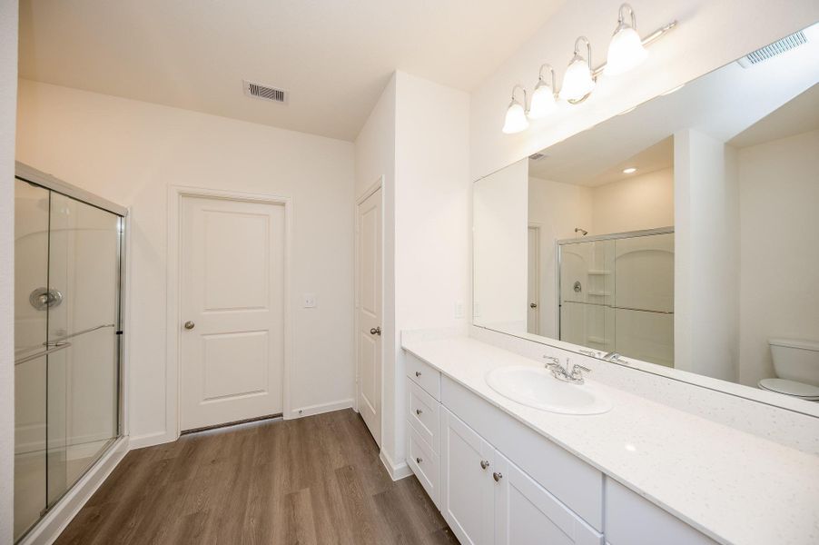 Furnished interior view inside a new home in Sunterra, Katy (Image 2). Furnished interior view inside a new home in Sunterra, Katy (Image 2).