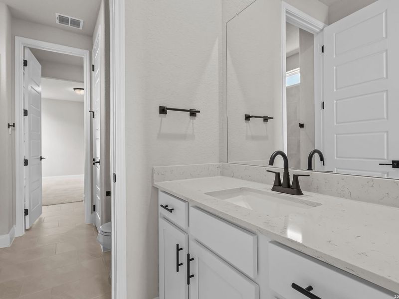 Furnished interior view inside a new home in Potranco Oaks, Castroville (Image 20).