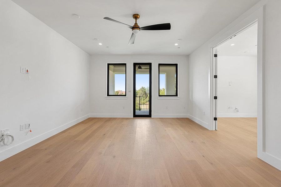 Spacious, unfurnished interior of a new home in Milky Way at River Place, Austin (Image 37).