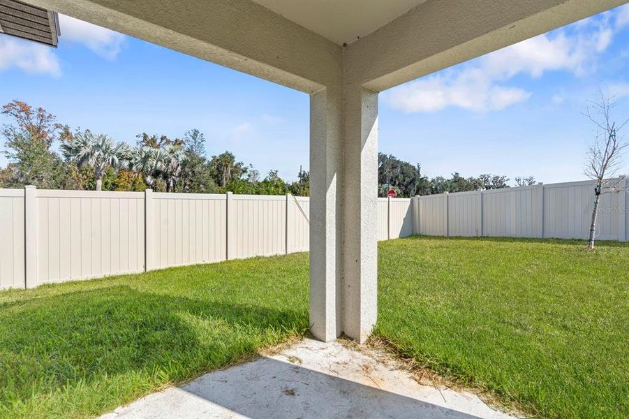 Exterior details and patio area of a home in North Park Isle: The Estates II, Plant City (Image 30). Exterior details and patio area of a home in North Park Isle: The Estates II, Plant City (Image 30).