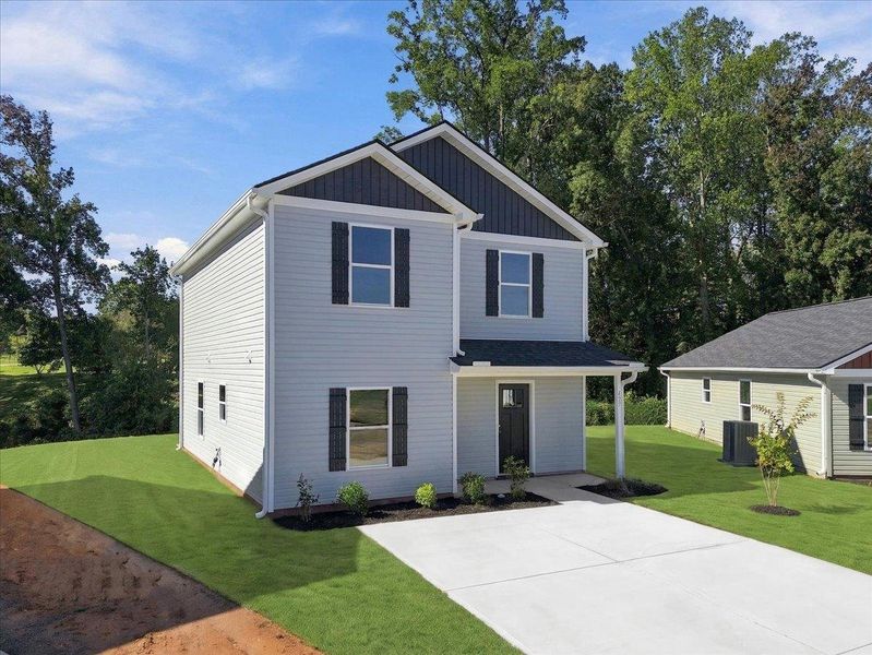 Front exterior of a new home in Stones Throw, Inman, SC, highlighting curb appeal (Image 18).