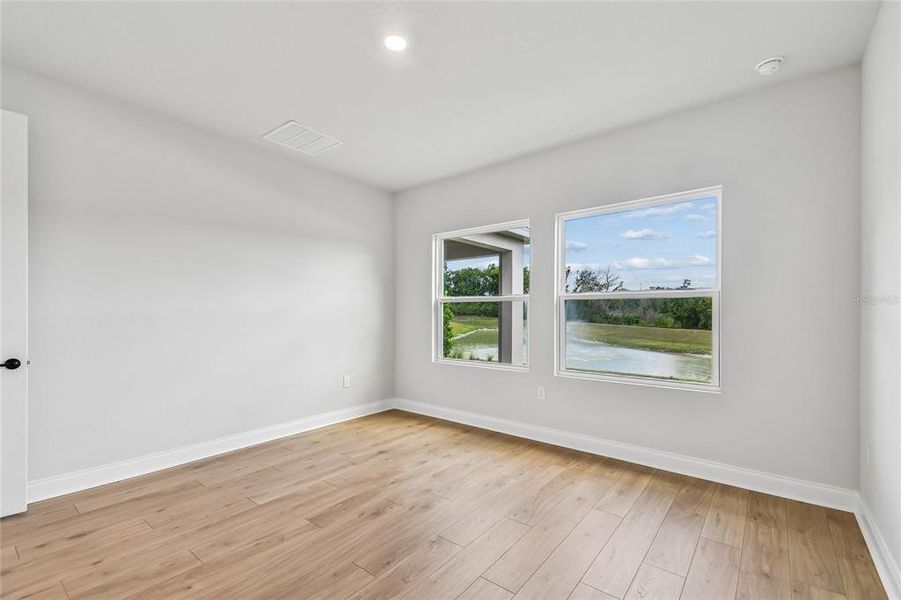 Spacious, unfurnished interior of a new home in Oakfield at Mount Dora Village Series, Mount Dora (Image 32).