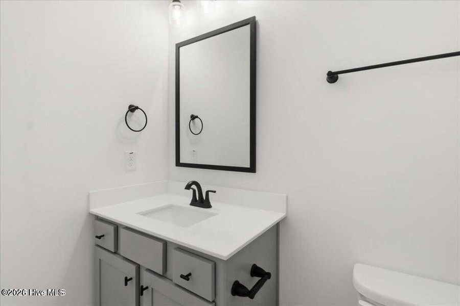 Furnished interior view inside a new home in Wood Creek Landing, Leland (Image 15).