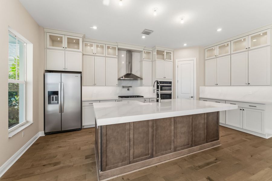 Furnished interior view inside a new home in Newfield - Rosette Park, Palm City (Image 4).