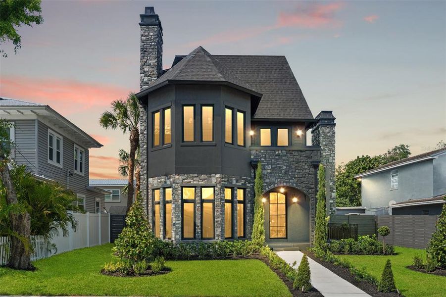 Front exterior of a new home in , Tampa, FL, highlighting curb appeal (Image 27).