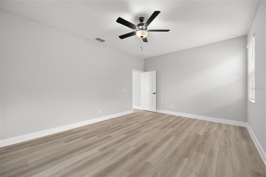 Spacious, unfurnished interior of a new home in Gum Lake Preserve, Lake Alfred (Image 19).
