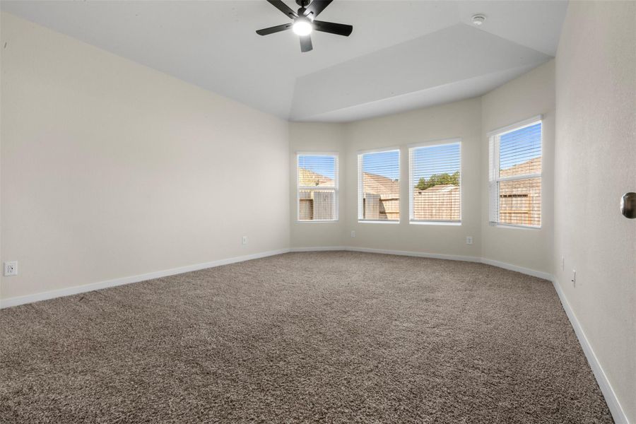 Another view of primary bedroom