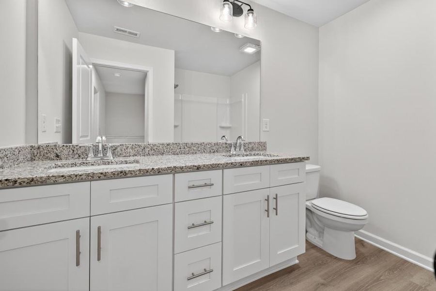 Furnished interior view inside a new home in Medlock Park, Austell (Image 4).