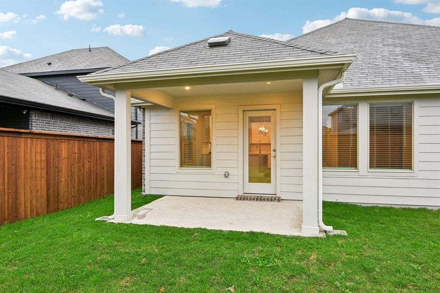 Exterior details and patio area of a home in Lakehaven - Signature Series, Farmersville (Image 3).