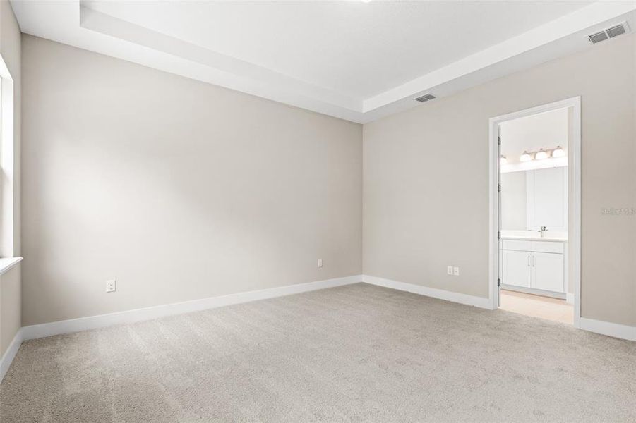 Spacious, unfurnished interior of a new home in Gray Hawk at Hole Two, Daytona Beach (Image 36).