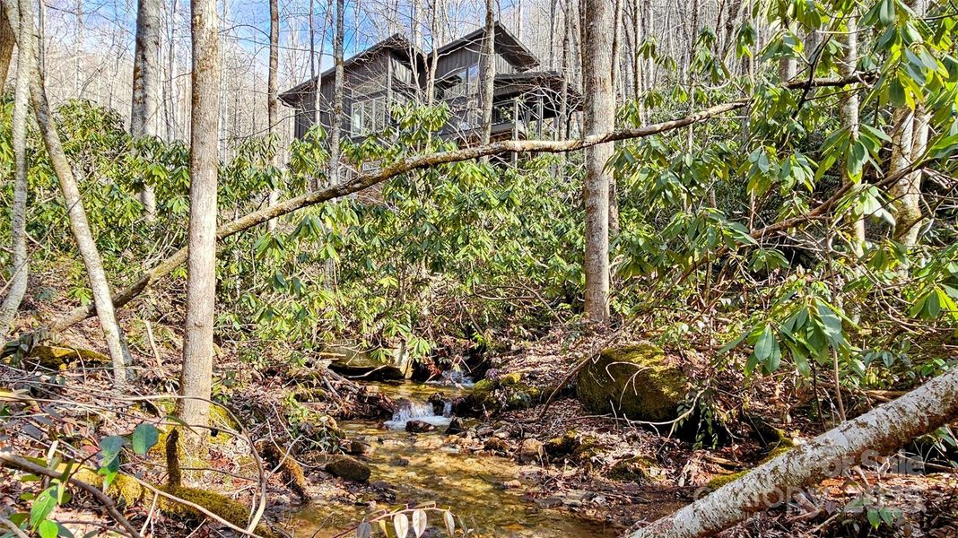Front exterior of a new home in , Sapphire, NC, highlighting curb appeal (Image 12). Front exterior of a new home in , Sapphire, NC, highlighting curb appeal (Image 12).