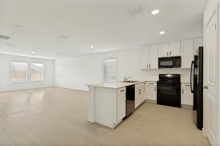 Furnished interior view inside a new home in Tillage Farms, Princeton (Image 6).
