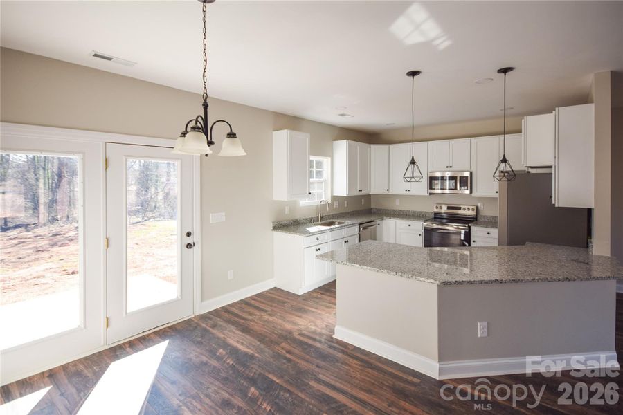 Furnished interior view inside a new home in , Hickory (Image 5).