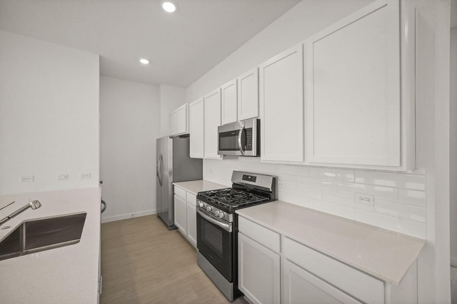 Furnished interior view inside a new home in Piccolina, Houston (Image 5).
