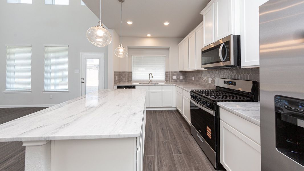 Representative furnished interior of a home built from the The Hawthorn by Legend Homes in Rocky Creek Crossing, Crowley (Image 7).