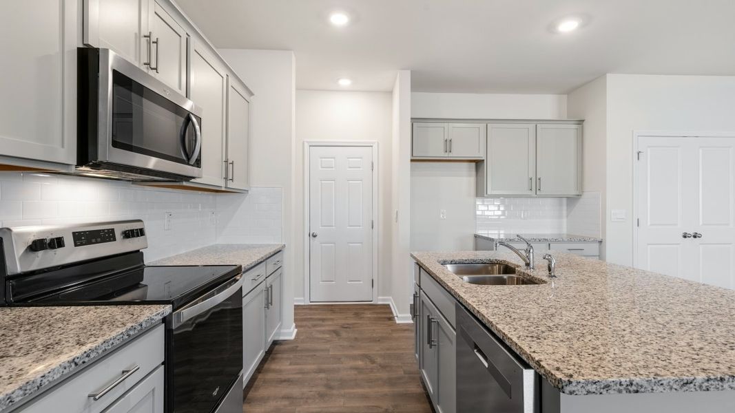 Furnished interior view inside a new home in The Grove at Matthews Landing, Fuquay Varina (Image 7).