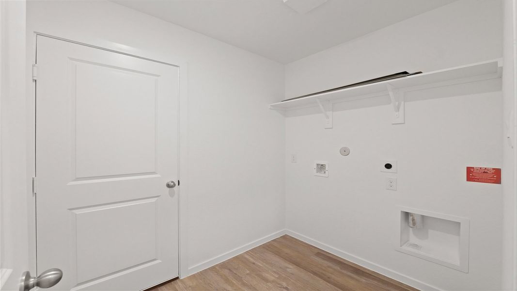 Representative unfurnished interior of a home built from the Estero by D.R. Horton in Lake Conroe Cove, Willis (Image 30). Representative unfurnished interior of a home built from the Estero by D.R. Horton in Lake Conroe Cove, Willis (Image 30).