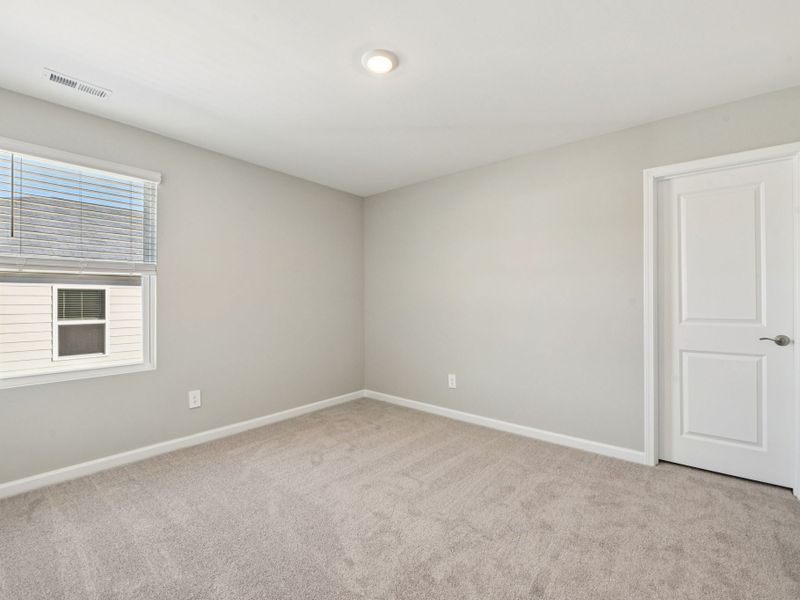 Spacious, unfurnished interior of a new home in Watkins Glen, Raleigh (Image 20).